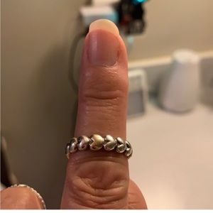 Pandora retired MOP/Pandora retired Heart ring with one gold heart.